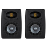 Black studio monitor speaker with visible branding on a white background